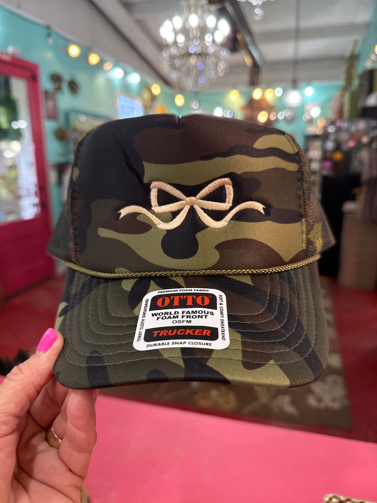 Coquette Bow Embroidered Camo Trucker Hat